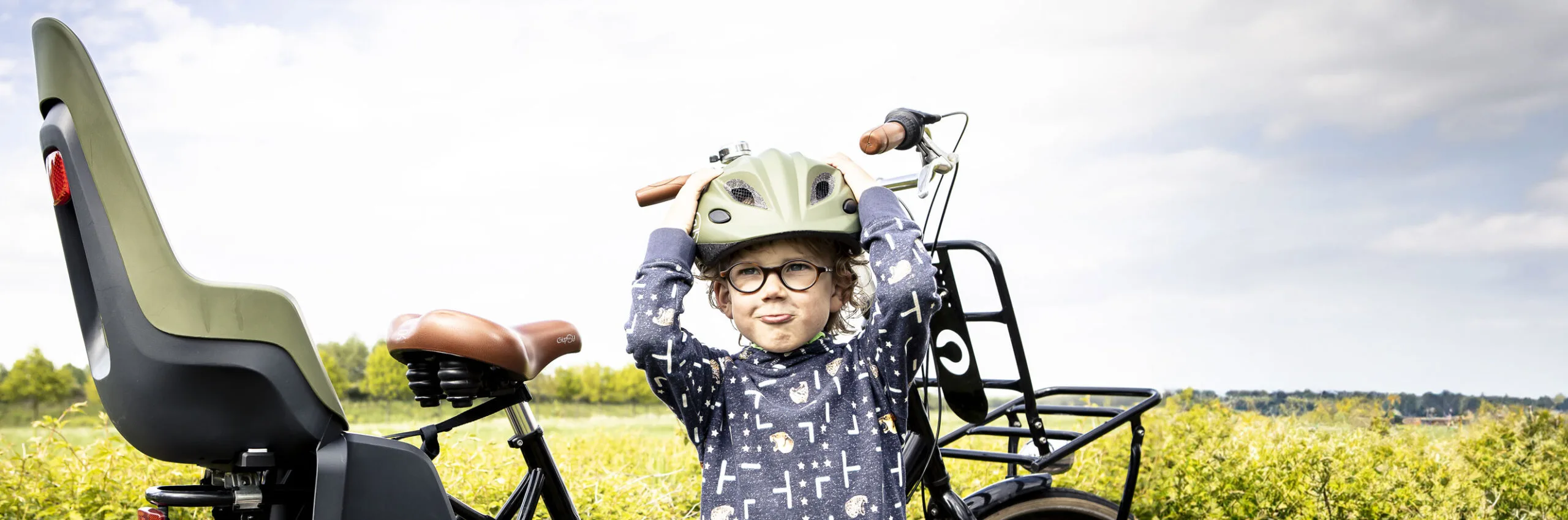 Child playing near Bobike Seat